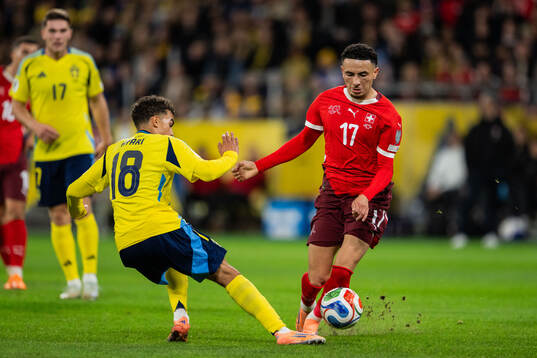 Yasin Ayari of Sweden and Ruben Vargas of Switzerland