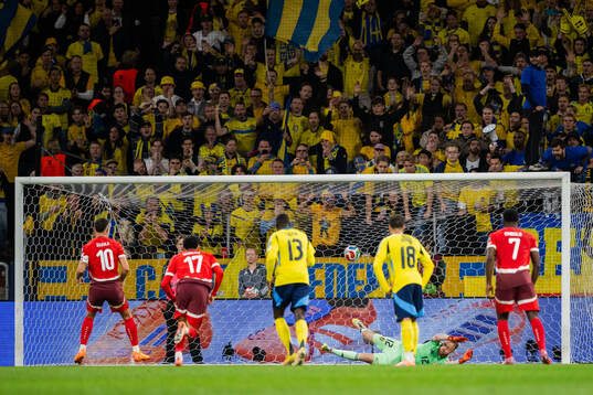 Granit Xhaka of Switzerland scores the 0-1 goal against