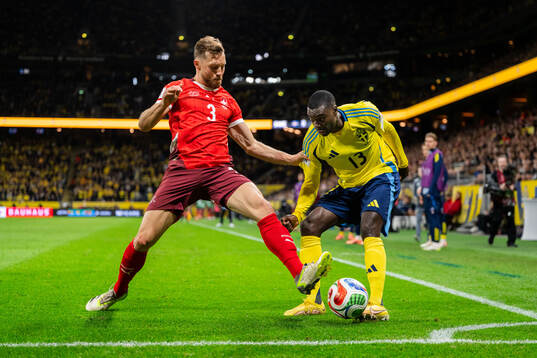 Silvan Widmer of Switzerland and Ken Sema of Sweden