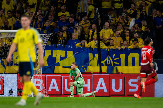 Goalkeeper Viktor Johansson of Sweden looks dejected