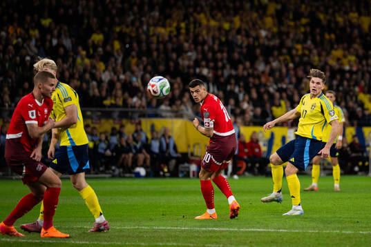 Granit Xhaka of Switzerland and Viktor Gyökeres of Sweden
