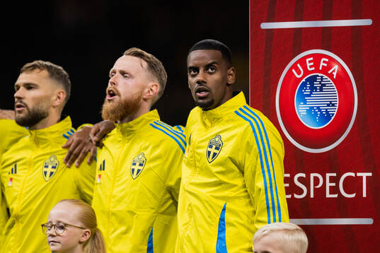 Goalkeeper Viktor Johansson and Alexander Isak of Sweden