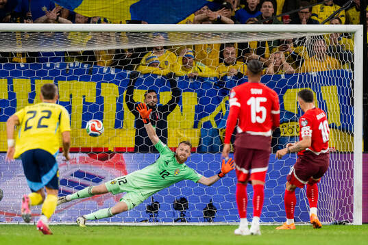Granit Xhaka of Switzerland scores the 0-1 goal against
