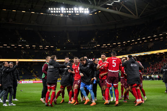 Players of of Switzerland celebrate