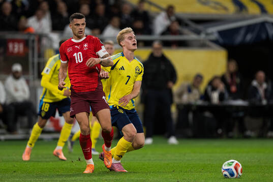 Granit Xhaka of Switzerland and Lucas Bergvall of Sweden
