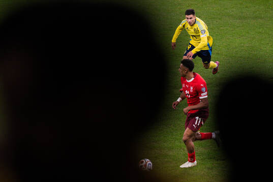 Dan Ndoye of Switzerland and Roony Bardghji of Sweden