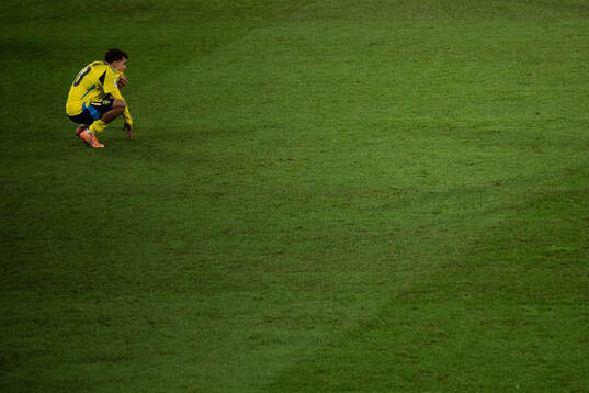 Yasin Ayari of Sweden looks dejected