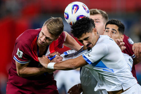 Kristoffer Ajer of Norway and Roy Revivo of Israel