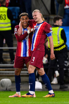Antonio Nusa and Erling Braut Haaland of Norway celebrate