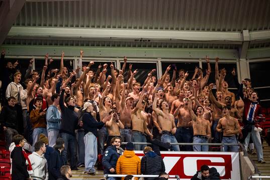 Spectators in the stands celebrates