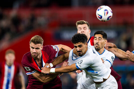 Kristoffer Ajer of Norway and Roy Revivo of Israel