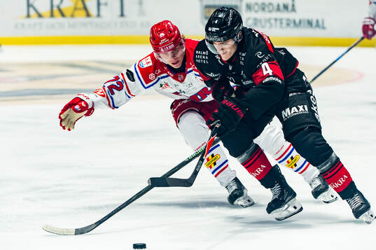 Malmö Redhawks Martin Schreiber och Timrås Erik Walli