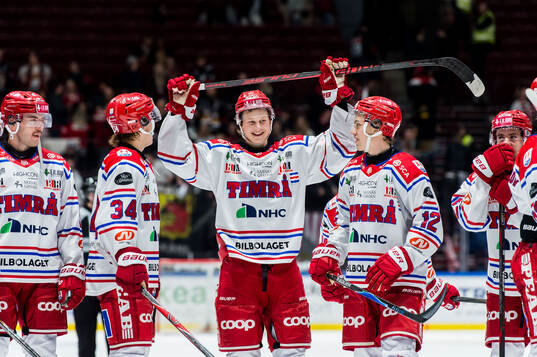 Timrås spelare jublar