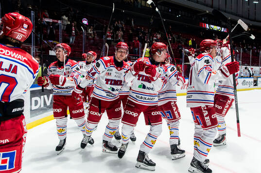 Timrås spelare jublar