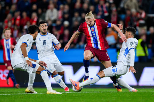 Erling Braut Haaland of Norway and Matan Baltaxa of Israel