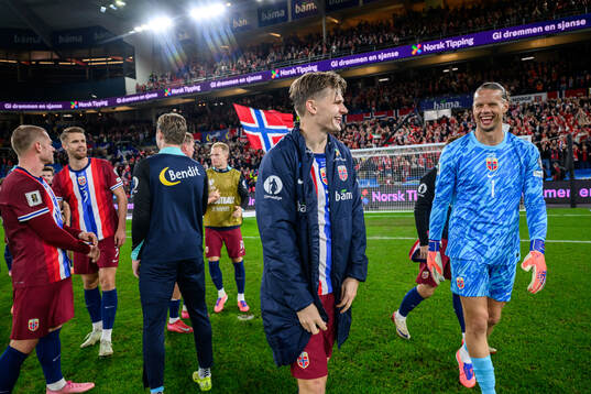 David Møller Wolfe and goalkeeper Ørjan Nyland of Norway