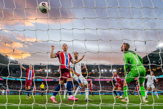 Antonio Nusa of Norway scores the 1-0 goal while Julian