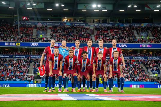The starting eleven of Norway pose for a team photo