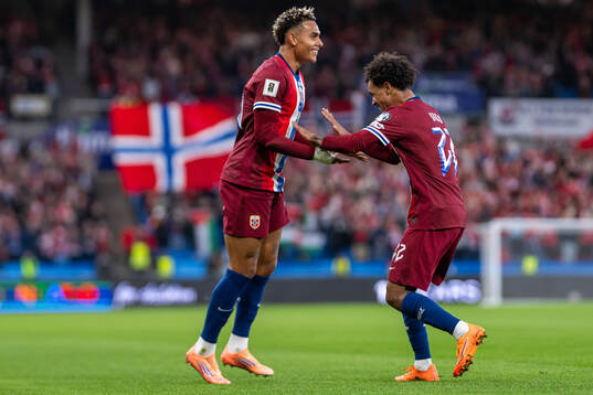 Antonio Nusa of Norway celebrates with teammate Oscar Bobb
