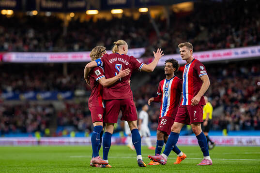 Erling Braut Haaland of Norway celebrates with Alexander