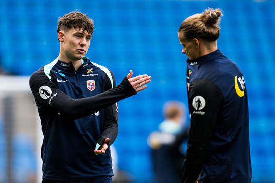 Jørgen Larsen and goalkeeper Ørjan Nyland of the