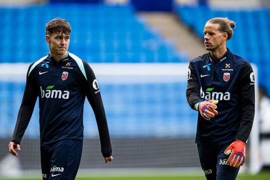 Jørgen Larsen and goalkeeper Ørjan Nyland of the