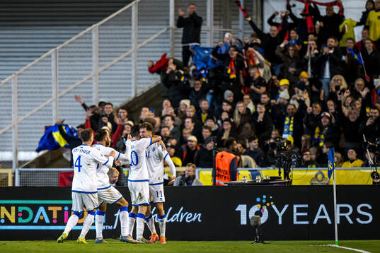 Fisnik Asllani of Kosovo celebrate with teammates the 0-1
