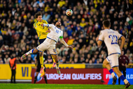 Victor Nilsson Lindelöf of Sweden and Vedat Muriqi of