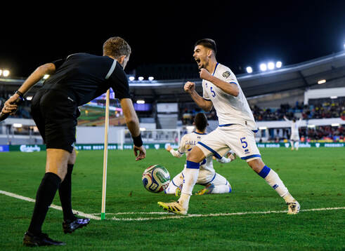Albian Hajdari of Kosovo celebrates