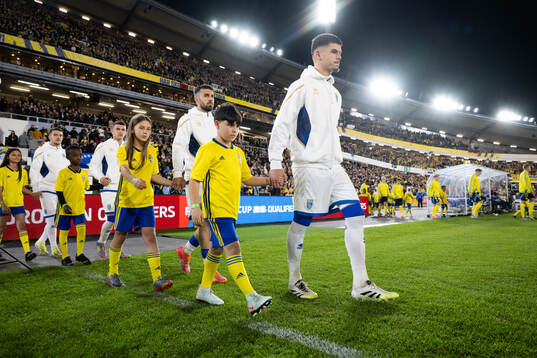 Mascots with players of Kosovo