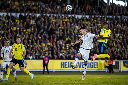 Albian Hajdari of Kosovo and Alexander Isak of Sweden