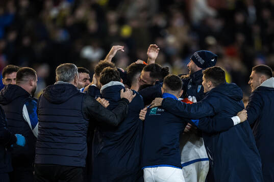 Players of Kosovo celebrate