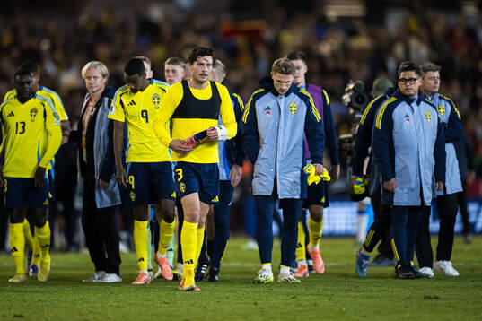 Victor Nilsson Lindelöf of Sweden looks dejected