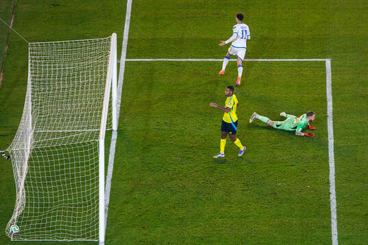 Fisnik Asllani of Kosovo celebrates