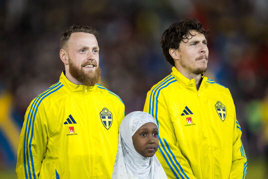 Goalkeeper Viktor Johansson and Victor Nilsson Lindelöf of