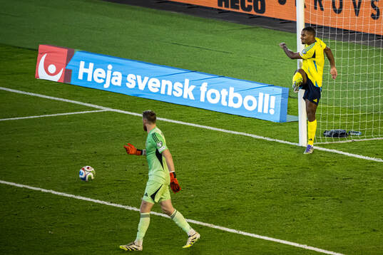 Goalkeeper Viktor Johansson and Isak Hien of Sweden look