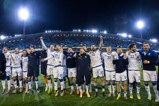 Players of Kosovo celebrate