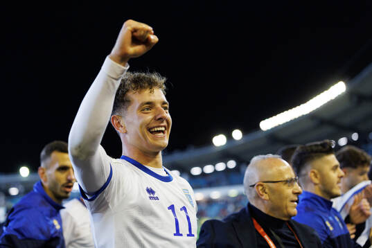 Fisnik Asllani of Kosovo celebrate