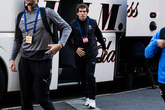 Joe Bell of New Zealand arrives