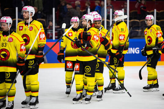 Players of SC Bern look dejected