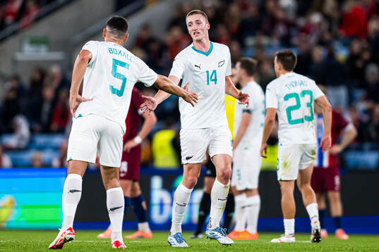 Finn Surman of New Zealand celebrates