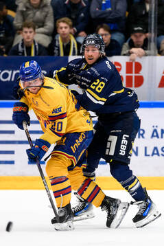 Djurgårdens Mathias Emilio Pettersen och HV71s Justin