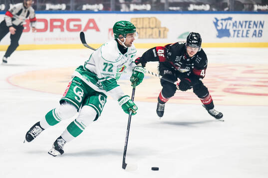 Rögles Daniel Zaar och Malmö Redhawks Lauri Pajuniemi