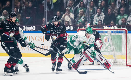 Malmö Redhawks Eemil Viro och Rögles Fredrik Olofsson
