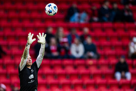 Goalkeeper Amund Wichne of Haugesund warms up