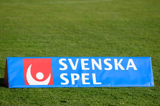 En reklamskylt för Svenska Spel
