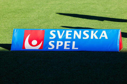 Logotyp för Svenska Spel på reklam