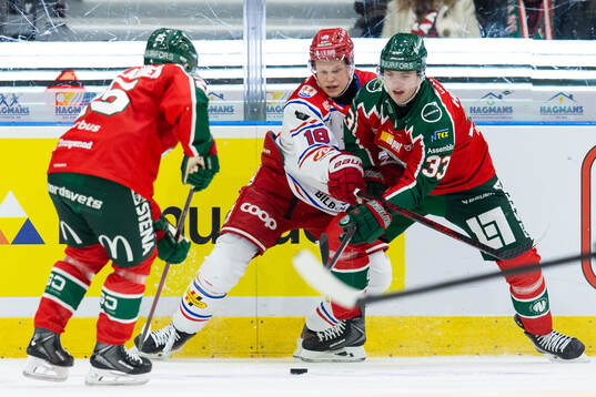 Timrås Eddie Genborg och Frölundas Linus Högberg
