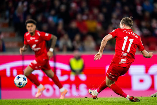 Bård Finne of Brann scores the 1-0 goal