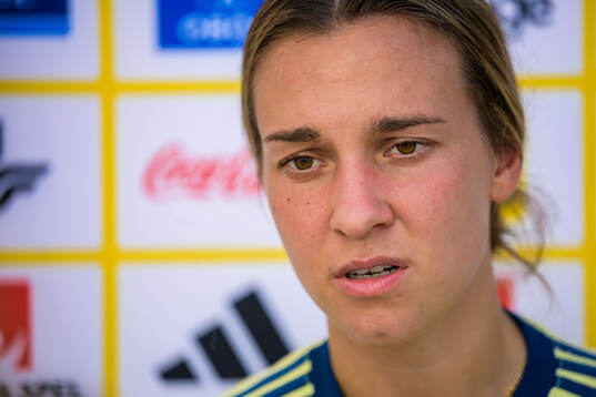 Julia Zigiotti Olme is interviewed by the media